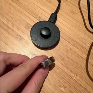 Oura Black Magnetic Charging Dock with Silver Metal Ring